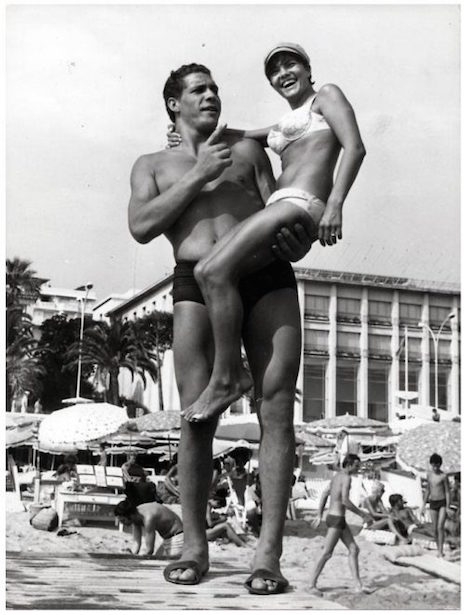 Andre the Giant at the beach picking up chicks