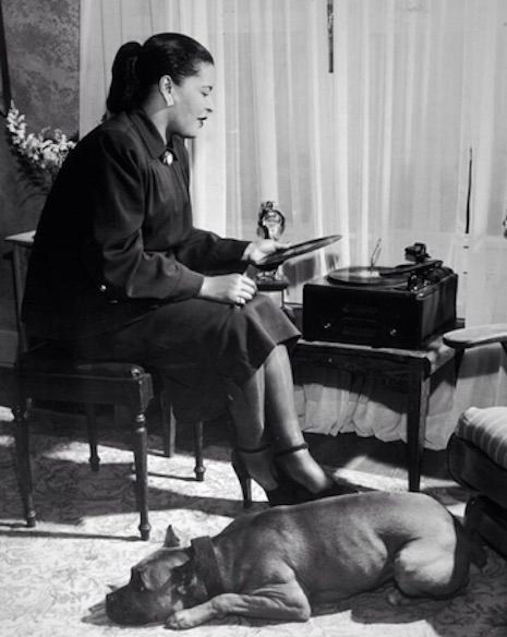 Bille Holiday, her pitbull Mister and her turntable