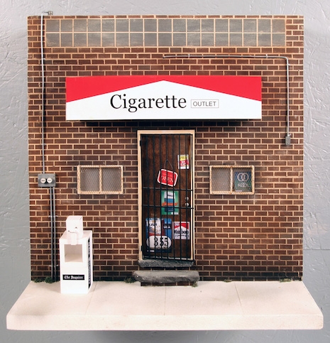 Miniature replica of Cigarette Outlet
