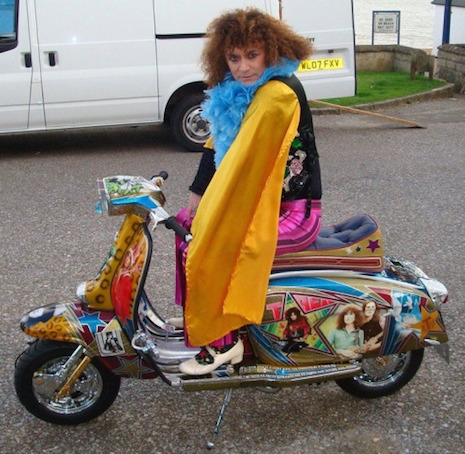 Danielz, the vocalist for the T. Rex tribute band, T.Rextasy sitting on the customized Marc Bolan Lambretta scooter