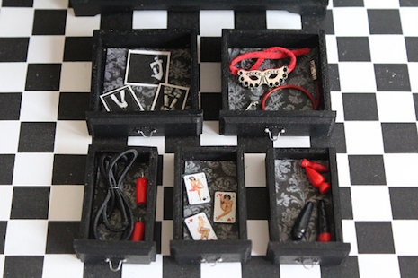 The contents of the drawers in the BDSM miniature cabinet