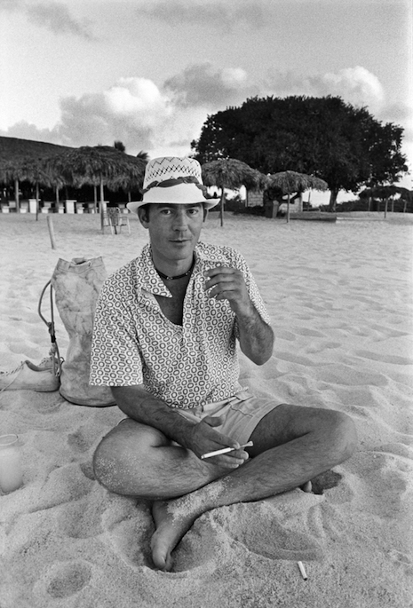 Hunter S. Thompson on the beach in Cozumel, Mexico, 1974