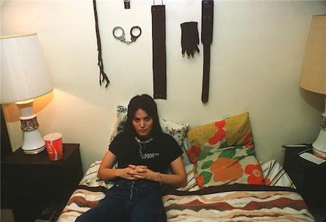 Joan Jett on her bed in LA 1977