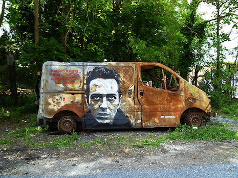 Joe Strummer mural painted on the side of a van by French artist, Jef Aerosol