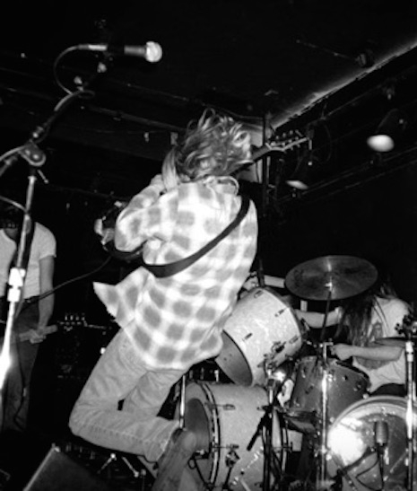 Kurt Cobain jumping into the crowd at Man Ray in Cambridge, Massachusetts, April 18, 1990
