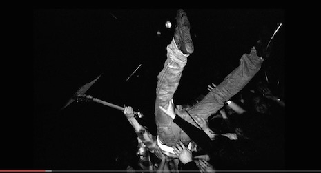 Kurt Cobain diving into the small crowd at ManRay in Cambridge, Massachusetts, April 18th, 1990