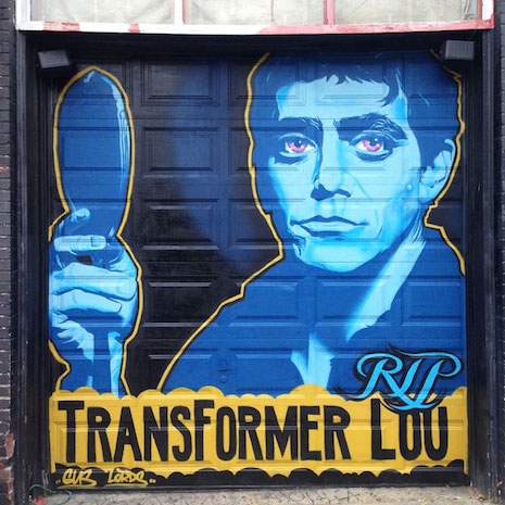 Lou Reed mural by artist Gus Cutty in front of Static Records in Asheville, NC