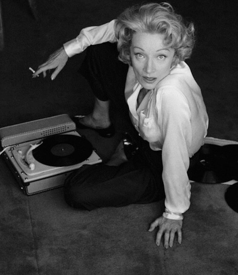 Marlene Dietrich and her turntable, 1956
