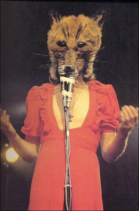 Peter Gabriel as the Fox during the tour for the 1972 album, Foxtrot in his wife's dress and a custom made fox head