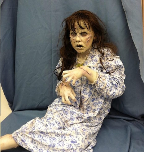 Life-sized sculpture of Regan MacNeil (played by Linda Blair) from The Exorcist (1973)