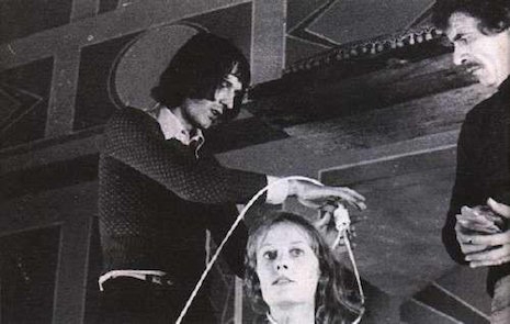 Dario Argento securing a noose around actress Eva Axén in preparation of one of cinema's greatest death scenes