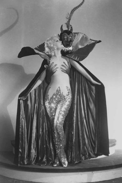 Actress Marian Martin and a burlesque cape featuring our pal, Satan, 1930s