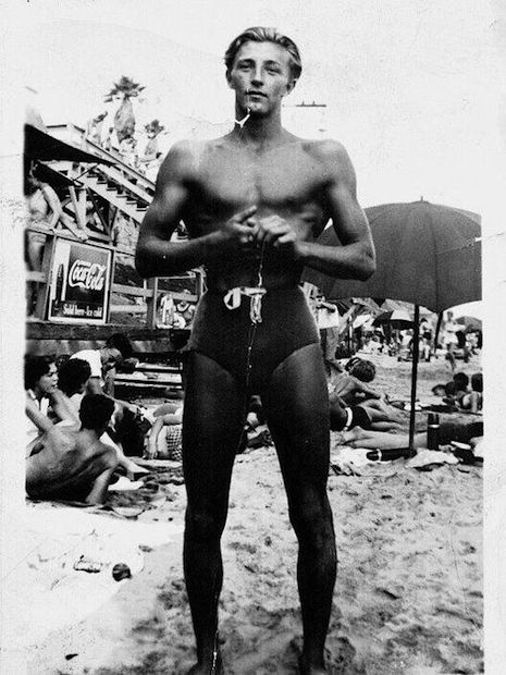 Robert Mitchum at the beach, 1942