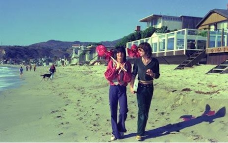 Mick Jagger and Ron Wood walking the beach 