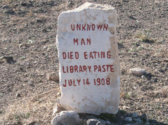 Headstone reads ‘Unknown Man Died Eating Library Paste,’ 1908