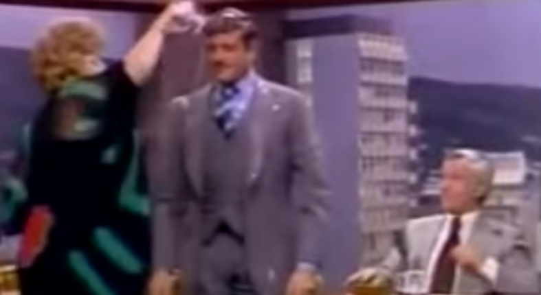 That time when Shelley Winters dumped whisky on Oliver Reed’s head for being a sexist ass, 1975