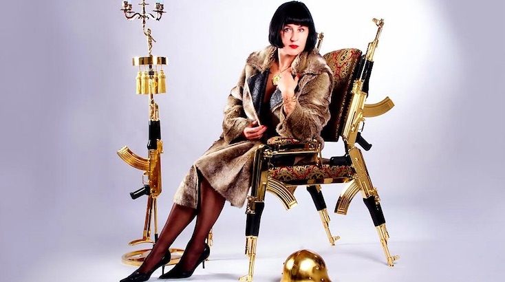 ‘Is this seat loaded?’ Artist makes a chair from gold-plated AK-47 rifles
