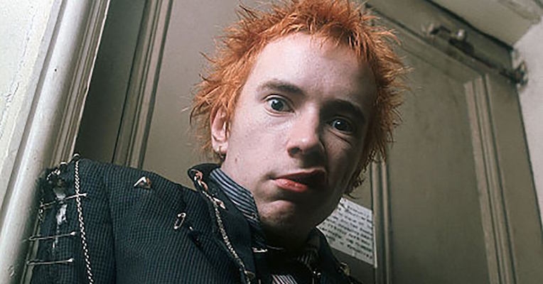 DJ Johnny Rotten plays music from his own record collection on the radio, 1977