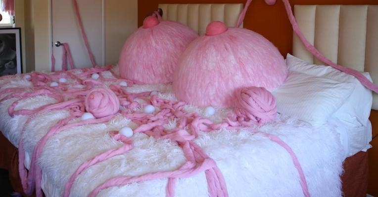 Breast-obsessed artist creates fluffy pink ‘Boobroom’
