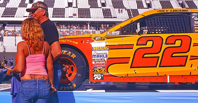 Super-saturated images of cars, corporate logos and mullets at the Daytona 500