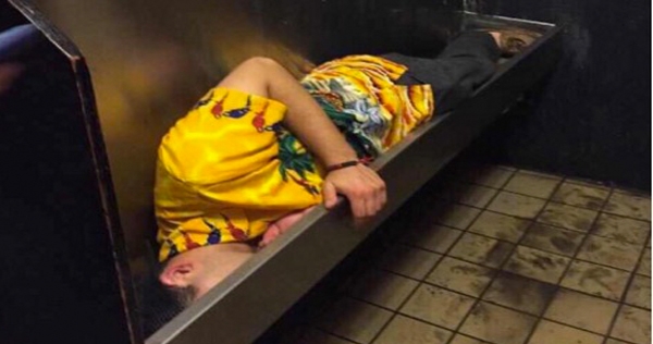 Urine for the night: Drunk South Carolina frat bro takes a wet nap in urinal
