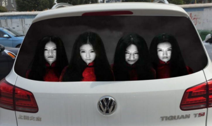 Drivers using freaky reflective face decals to discourage high-beam users