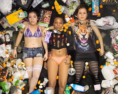 Photo series of Americans lying in seven days worth of their own garbage