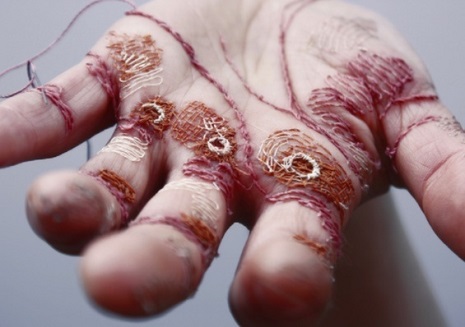 Hand-embroidered: Artist sews intricate designs into her own hand