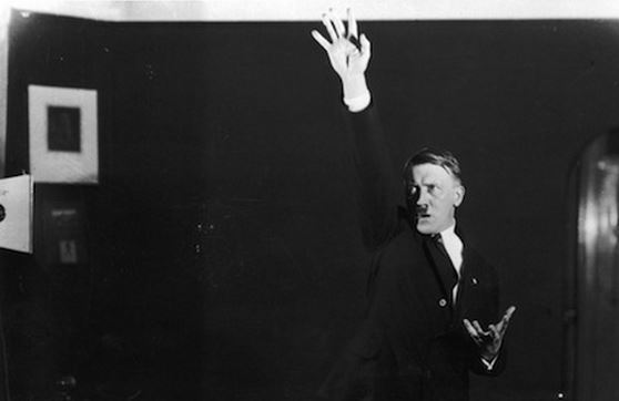 Weird private photographs of Hitler practicing dramatic gestures for his speeches