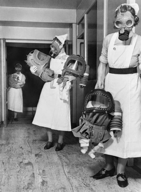 gyde Slid mammal Nuclear family: Apocalyptic images of babies and kids outfitted in gas masks  during wartime | Dangerous Minds