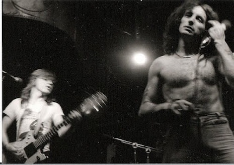 Bon Scott and Malcom Young at CBGB's August 27th, 1977