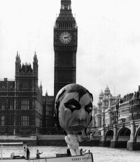 The Alice Cooper balloon taking a ride on the Ferry Prince floating by Big Ben and the House of Parliament in 1975