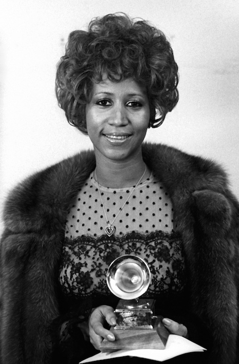 Aretha Franklin with her Grammy Award for her Simon and Garfunkel cover of