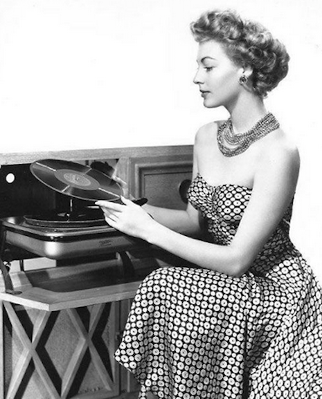 Ava Gardner and her record player, 1949