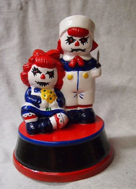 Black metal Raggedy Ann and Andy by Coffin Collector