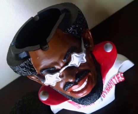 Vintage Bootsy Collins ashtray with the top off