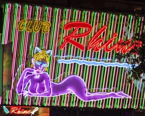A neon strip/sex club sing in Hong Kong
