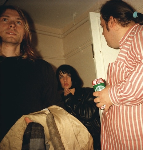 Kurt holding a coat