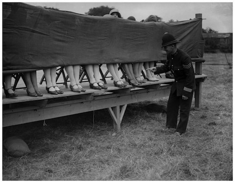 Policeman judging ankles in England, 1930