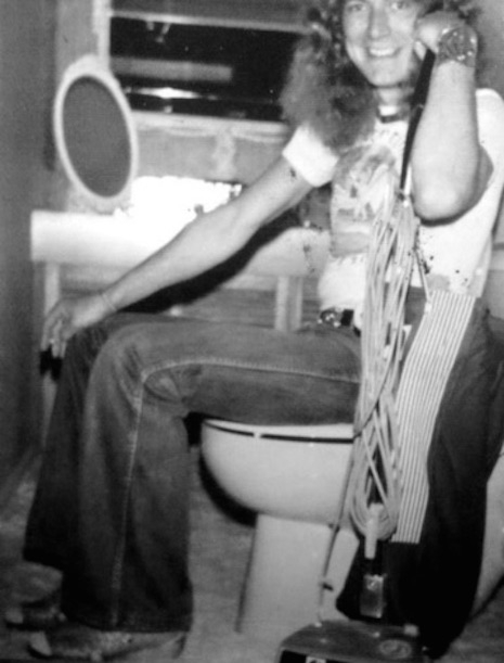 Robert Plant of Led Zeppelin on the toilet