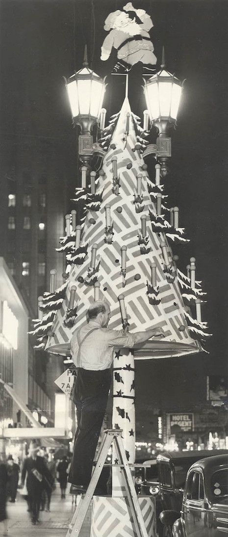 Putting up one of the huge metal Christmas trees along Hollywood Boulevard, 1937