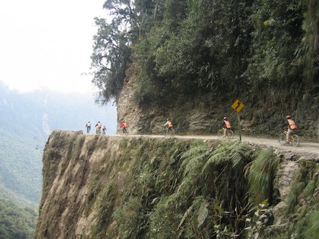 Bikers traveling the Death Road in Bolivia