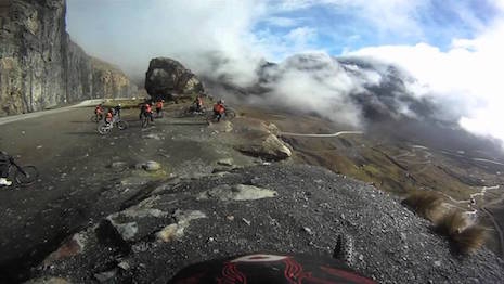 Bikes stop to admire the Death Road in Bolivia