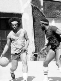 Rev. Jesse Jackson and Marvin Gaye playing basketball