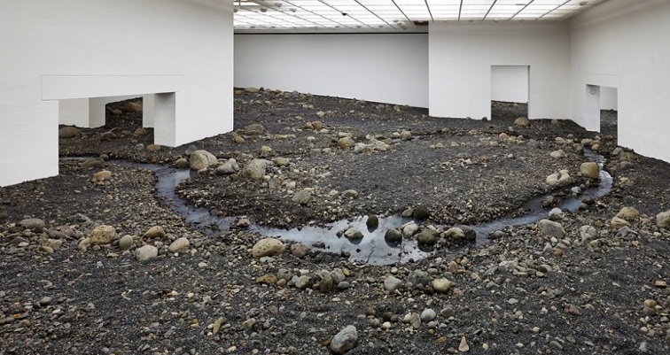 Artist creates riverbed that fills an entire wing of museum