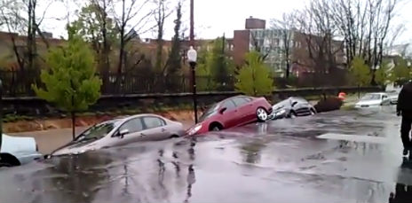 Holy hell! Watch an entire street in Baltimore sink right into the earth!