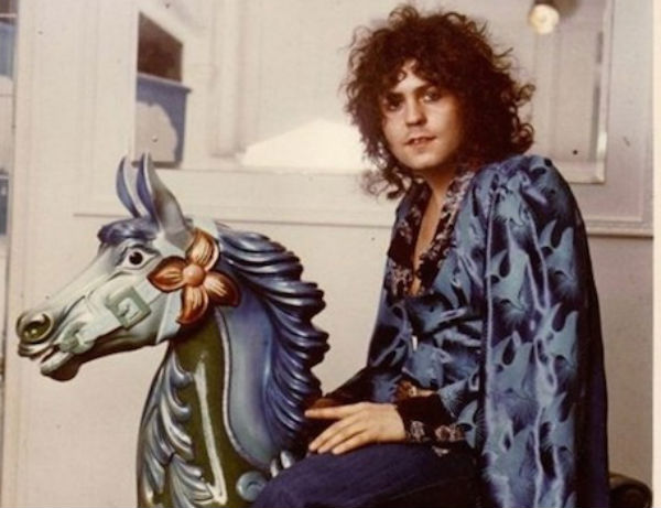 Pictures of Marc Bolan riding on top of things