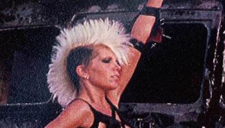The Plasmatics destroy the stage with an exploding Cadillac